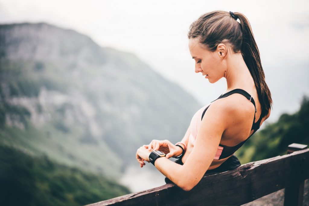 Fitness spot girl training in mountain.
